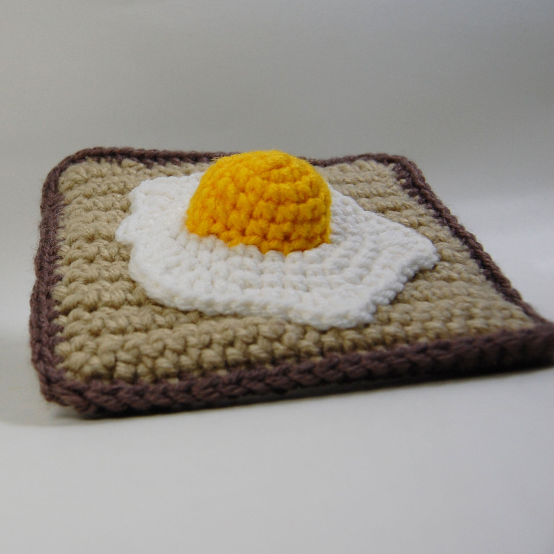 https://www.madebyjody666.com/cdn/shop/products/fried-egg-crochet_56dcb171-e600-44ce-ad40-d701435dfb42_1946x.jpg?v=1653010719